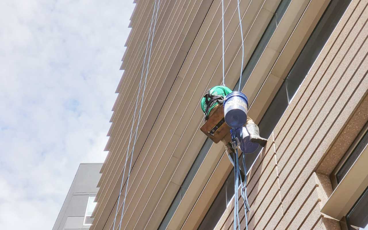 Commercial Concrete Restoration and Waterproofing Services on Exterior of Office Building